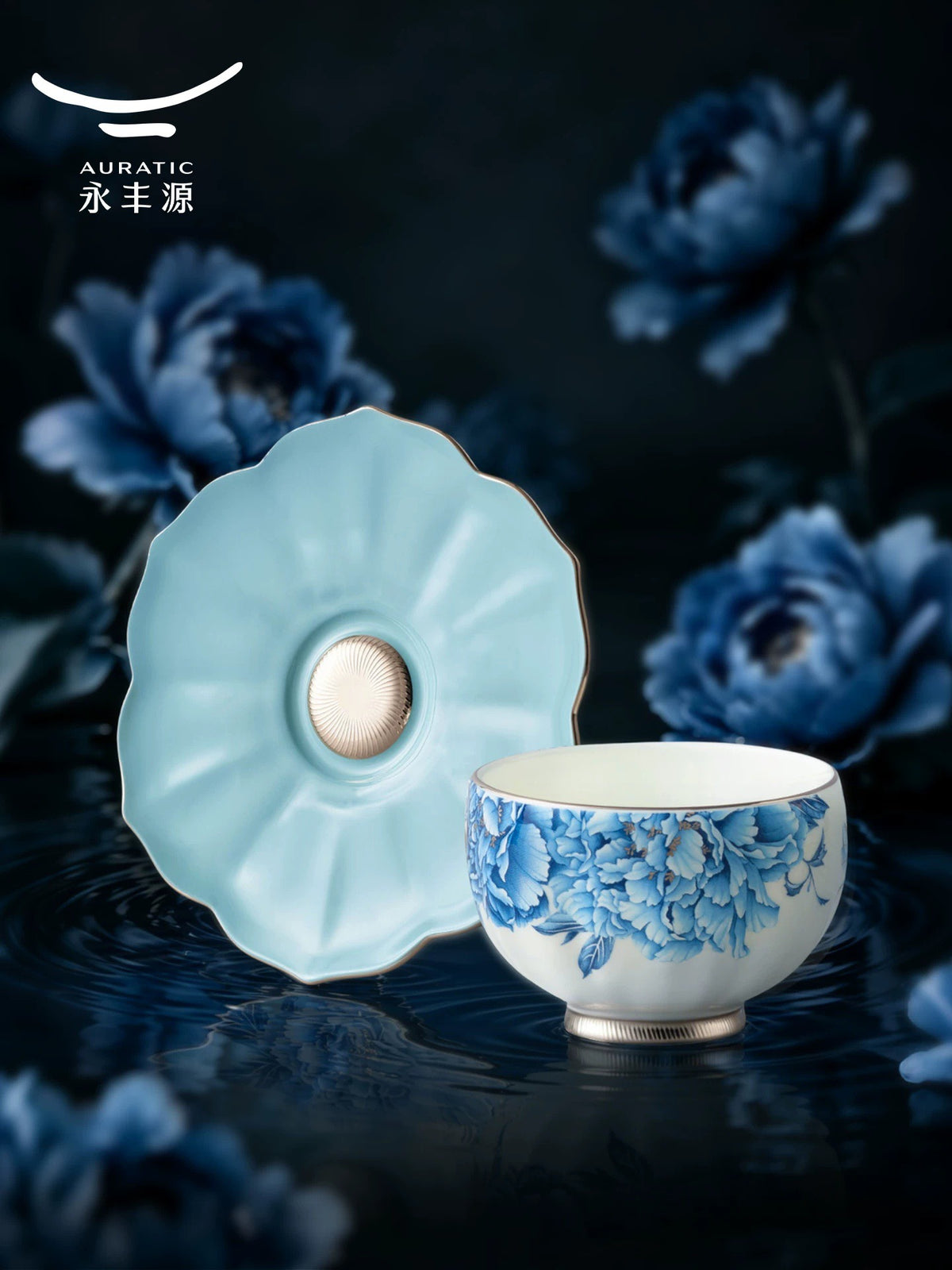 Close-up of a blue peony porcelain teacup on a petal-shaped sky-blue saucer with platinum base